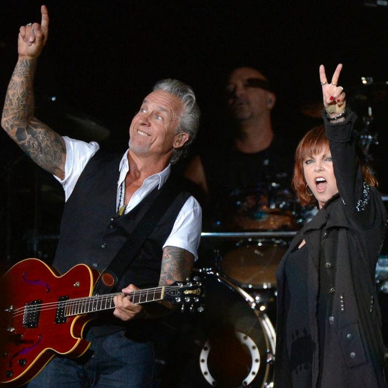 Pat Benatar and Neil Giraldo acknowledge the crowd during a show in 2012 at the Peoria Civic Center. They return to the venue on Aug. 15