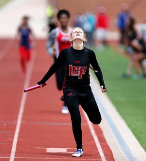 Lubbock Cooper's Hollie Windham wind the 4x400 relay. High school track meet held at PlainsCapital Park Lowrey Field Friday Apr 15, 2016, in Lubbock, Texas. (Mark Rogers/AJ Media)