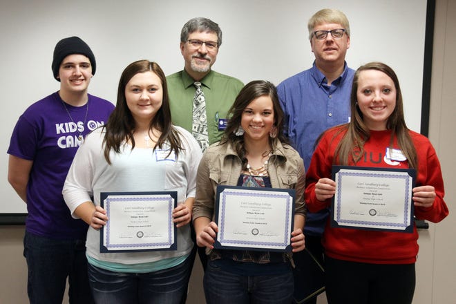 United High School’s Antique Bean Cafe team won the inaugural Carl Sandburg College Business Simulation Competition Thursday. Front row, left to right, are: Team members Tiffany Hart, Natalie Johnson and Addy McKee. Back row, left to right, are John Ryner, Sandburg business student and team mentor; Keith Williams, Sandburg coordinator of business program and instructor of economics and business administration; and Joel Zinker, teacher at United. 

BILL GAITHER/Carl Sandburg College

...