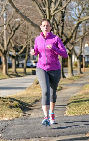 Kaitlyn Maloney of Worcester trains for the Boston Marathon. T&G Staff/Steve Lanava
