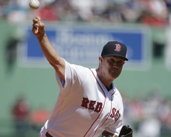 Knuckleballer Steven Wright delivers against the Toronto Blue Jays Sunday at Fenway Park, The consistent Wright is making a strong pitch to remain in the Red Sox rotation.