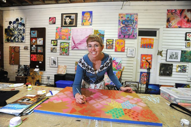 TIMES-REPORTER PAT BURK

Artist Sarah Dugger works on a piece at her Mr. McGuillicutty Art Studios on Walnut Street in Dover Tuesday.