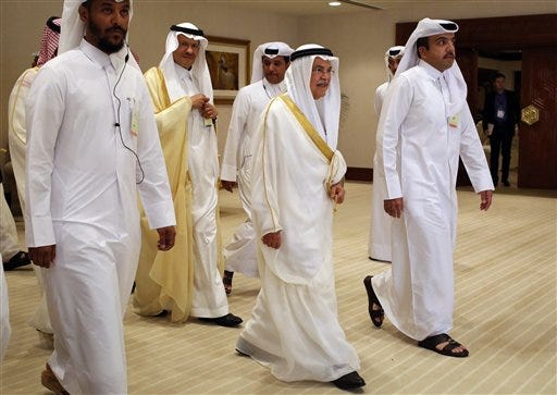 audi Oil Minister Ali al-Naimi, center right, arrives at an oil-producers' meeting in Doha, Qatar, on Sunday, April 17, 2016. Oil-producing countries are meeting in Qatar to discuss a possible freeze of production to counter low global prices, but Iran's last-minute decision to stay home could dilute the impact of any agreement.