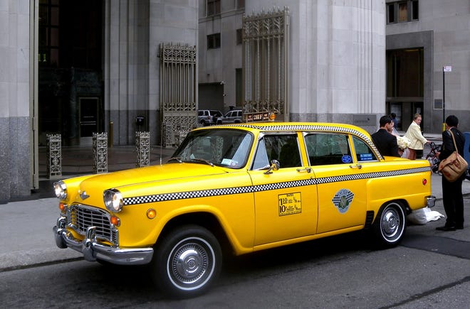 Here’s a great photo of the Checker Taxi Cab auto enthusiasts have come to love and reminisce about. It was always a boxy design that was high on interior room and large on trunk space. (Photo compliments Jim Hendersen).
