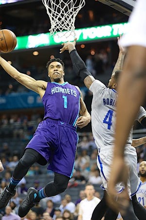 Courtney Lee takes the ball to the basket during the Charlotte Hornets' win over the Brooklyn Nets on April 8 at Time Warner Cable Arena in Charlotte. Chris Coutinho/Special to The Gazette