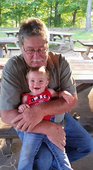 Jeffrey Vandermallie, pictured with his granddaughter, was killed in a fatal Farmington crash on March 11. SUBMITTED PHOTO