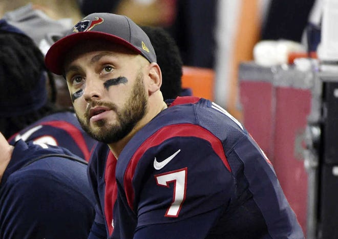 Former Houston Texans quarterback Brian Hoyer sits on the bench during the second half of a playoff game against the Kansas City Chiefs on Jan. 9 in Houston. Hoyer was cut by the Texans on Tuesday. (AP Photo/Eric Christian Smith)