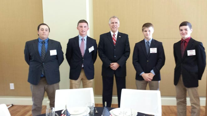 (From left) Isaac Williams, Will Stites, North Carolina Senator Thom Tillis, Reynolds Montgomery and Mason Leonard at the Earl Scruggs Center on Saturday, April 16, for the annual Reagan Day Dinner, where Tillis was the featured speaker. Williams, Stites, Montgomery and Leonard are members of the Shelby High School Young Republicans and were nominated to attend the annual event, which was also attended by NC House Speaker Tim More, Senator Warren Daniels and Congressman Patrick McHenry. Submitted by Wendell Leonard.