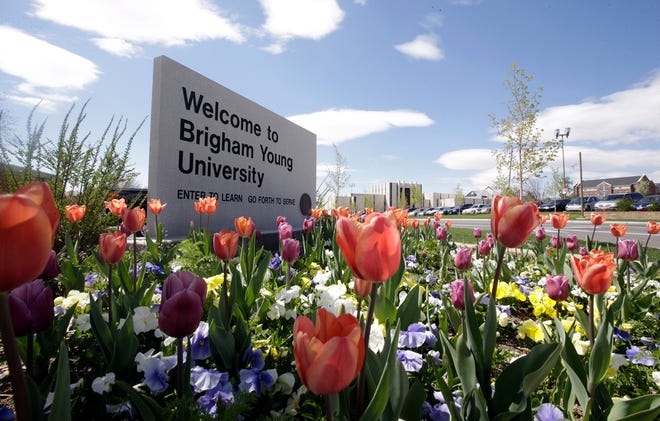 In this Tuesday, April 19, 2016, a welcome sign to Brigham Young University sits at the school in Provo, Utah. BYU students who say they were sexually assaulted are finding themselves under investigation for possible violations of the Mormon school's code against sex and drinking. BYU says it will re-evaluate the practice. (AP Photo/Rick Bowmer)