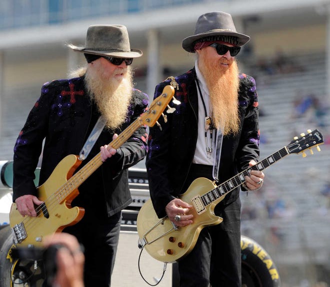ZZ Top members Dusty Hill (left) and Billy Gibbons perform in 2015. The ZZ Top concert planned for May 4 at Bell Auditorium has been postponed until Oct. 26 while bassist Hill recovers from an injury.