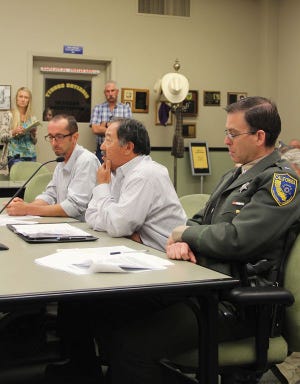 Respresentatives from the California Department of Fish and Wildlife addressing the board of supervsiors at Tuesday’s meeting. Program Manager Curt Babcock (furthest), Regional Manager Neil Manji (center) and Lieutenant Warden Steven McDonald (closest).