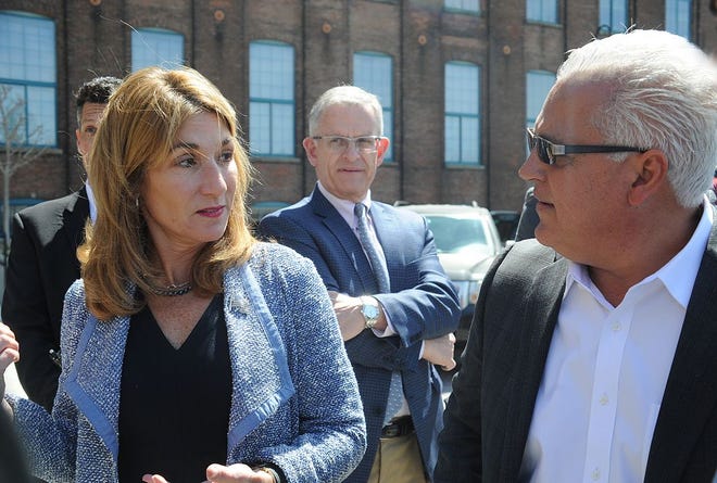 Anthony Cordeiro, one of the owners of Commonwealth Landing, talks with Lt. Gov. Karyn Polito during a tour of the property on Thursday.