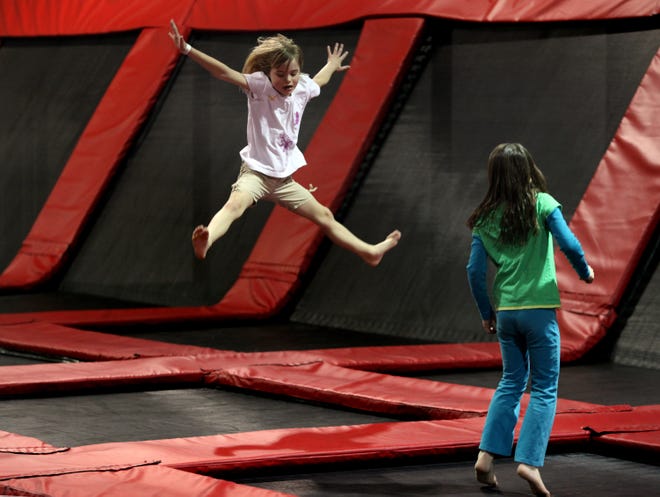 Children jump on indoor trampolines. (Stacey Wescott/Chicago Tribune/MCT)