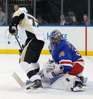 Pittsburgh Penguins right wing Patric Hornqvist (72) knocks the puck past New York Rangers goalie Henrik Lundqvist (30) for a goal during the first period of Game 4 of an NHL hockey first-round Stanley Cup playoff series, Thursday, April 21, 2016, in New York. The Penguins won 5-0. (AP Photo/Julie Jacobson)