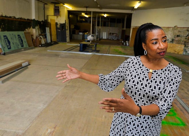 Peoria 1st District Councilwoman Denise Moore stands in the Minority Business Development Center at 2139 SW Adams St., under construction.