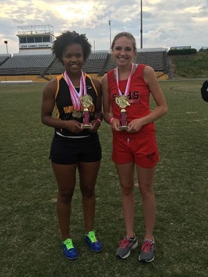 Most valuable awards at the second annual Pink Ladies Invitational track and field meet at Kings Mountain High School on Thursday were Kings Mountain's Gwen Hopper, left, in field events and South Point's Aurora Ziemer in running events. Special to The Star