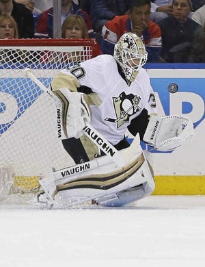 Pittsburgh Penguins goalie Matt Murray stops a shot by the New York Rangers during the first period of Game 3 of a first-round NHL playoff hockey series Tuesday, April 19, 2016, in New York. (AP Photo/Frank Franklin II)
