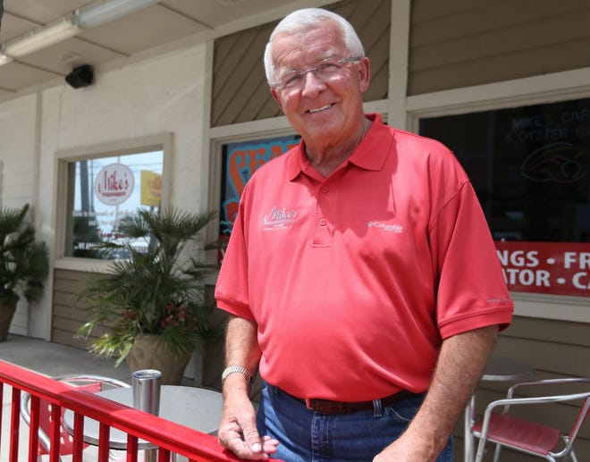 Newly elected Panama City Beach Mayor Mike Thomas stands outside Mike's Cafe and Oyster Bar, which he has owned for 30 years.