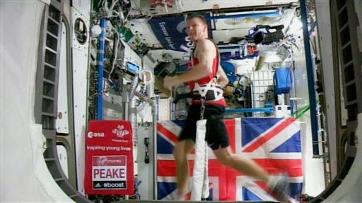 British astronaut Tim Peake in action running the London marathon while strapped to a treadmill to counter the lack of gravity at the International Space Station on Sunday April 24, 2016. While the official 2016 London Marathon was being run in London, Peake ran 26.2 miles on a treadmill in three hours 35 minutes 21 seconds, while aboard the space station in orbit 250km above the Earth.(EUROPEAN SPACE AGENCY (ESA) via AP) TV OUT