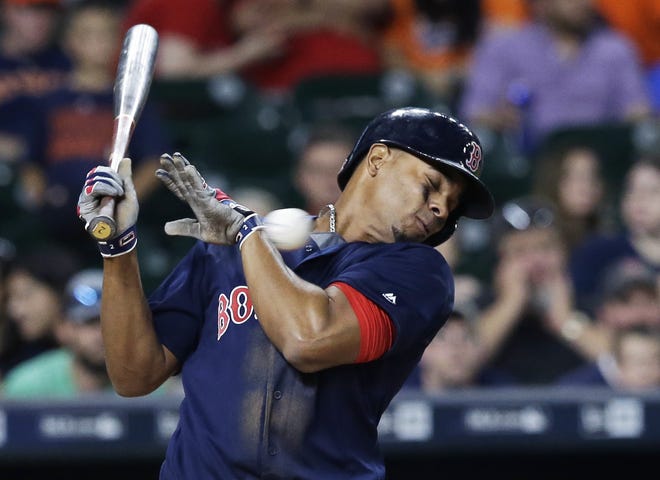 Red Sox shortstop Xander Bogaerts was back in the lineup on Sunday against the Astros after missing Saturday's game following getting hit on the hand by a pitch on Friday night.