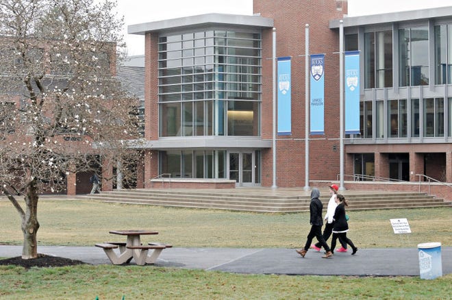 Students walk through the Bucks County Community College Newtown campus