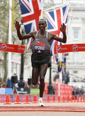 Kirsty Wigglesworth Associated Press Eliud Kipchoge of Kenya wins the men's race in the London Marathon on Sunday.