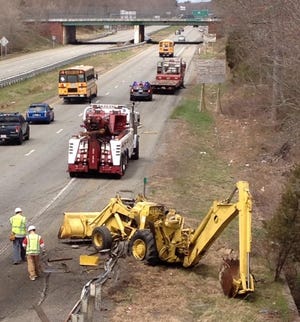 State Police responded to the area of Route 24 north after a front-end loader fell off the back of a trailer.