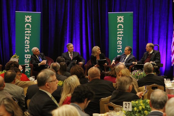 From left, Sens. Jack Reed, Sheldon Whitehouse and Reps. David Ciccilline and James Langevin answer questions by Chamber president Laurie White at the Greater Providence Chamber of Commerce's congressional breakfast at the Crowne Plaza in Warwick. The Providence Journal/Steve Szydlowski