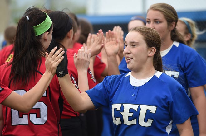 Conwell-Egan softball players high-five Archbishop Ryan players following their game at Conwell-Egan on Tuesday, April 26, 2016. Archbishop Ryan won 7-1.