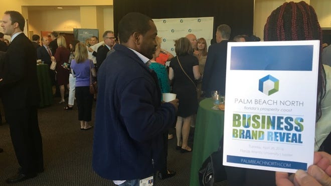 About 400 people attended this morning’s Northern Palm Beach County Chamber of Commerice meeting to announce a branding initiative for the 10 communities north of and including Mangonia Park. (Photo by Bill DiPaolo)