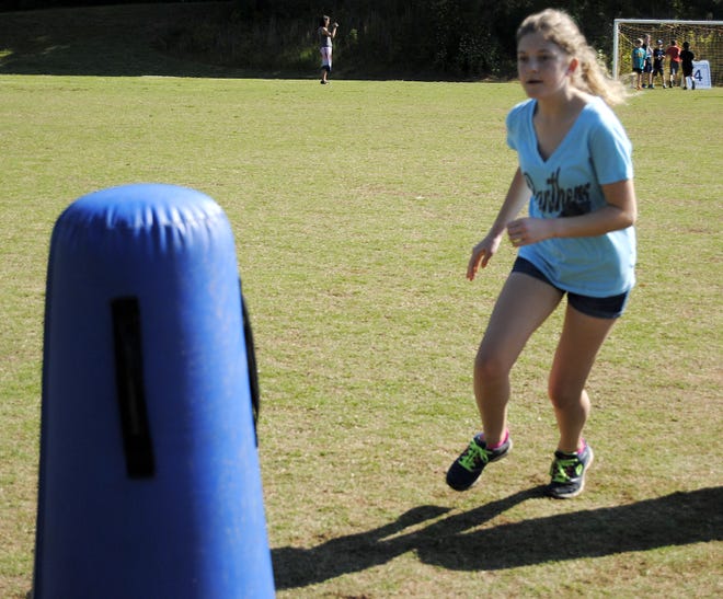 Joyce Orlando/ The Star

Caitlyn McCutchan works on some agility drills at the Panthers Play 60 camp on Wednesday.