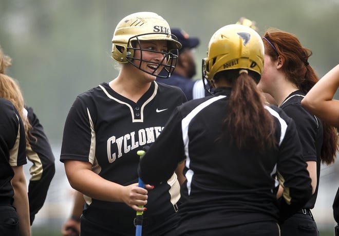 Sacred Heart-Griffin's Ashton Dyche is congratulated by her teammates at home plate after hitting a grand slam against Southeast making it 8-0 Cyclones in the second inning during the City Series softball tournament at Comstock Field, Wednesday, April 27, 2016, in Springfield, Ill. Justin L. Fowler/The State Journal-Register
