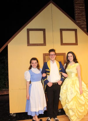 PHOTO BY GEORGE AUSTIN

The lead roles in the "Beauty and the Beast" productions at the high school will be played by, from left to right, Jillian Brooks-Duval, who will play Belle in some of the performances, Jonah Salamon, who will play the beast, and Allison Pereira, who will play Belle in some of the performances.