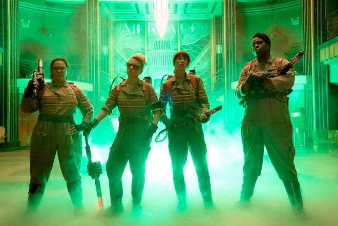 From left, Melissa McCarthy , Kate McKinnon, Kristen Wiig and Leslie Jones are seen here in a scene from "Ghostbusters," which opens in theaters on July 15. Hopper Stone/Columbia Pictures/Sony Pictures via AP