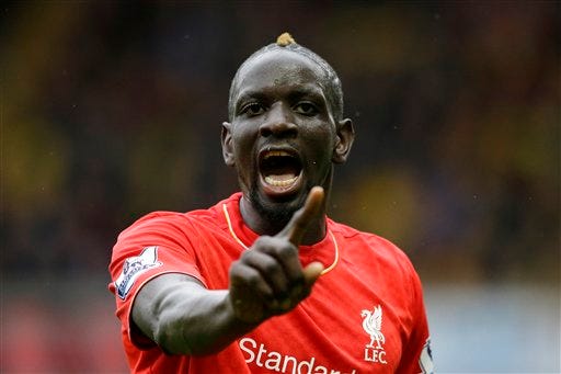 FILE- In this file photo dated Sunday, Dec. 20, 2015, Liverpool's Mamadou Sakho during the English Premier League soccer match against Watford at Vicarage Road stadium in Watford, England. It has been announced Saturday April 23 2016. Sakho is being investigated by UEFA over failed drugs test after last month’s Europa League game against Manchester United. (AP Photo/Matt Dunham, FILE)