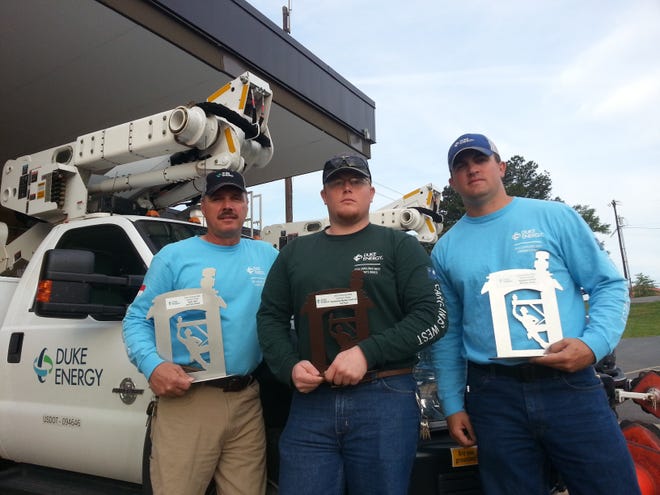 From left, Neal Walker, Andrew Stover and Brad Deaton, linemen out of Duke Energy's Shelby Operations Center, competed Saturday in the 13th annual Lineman's Rodeo at the Cleveland County Fairgrounds. Special to The Star