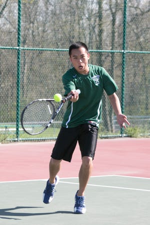Minisink Valley senior Dalton Chu returns a shot during Wednesday's match against Kingston. Chu took last season off to focus on his studies. The move paid off as he will be attending Johns Hopkins University in the fall. Allyse Pulliam/For the Times Herald-Record