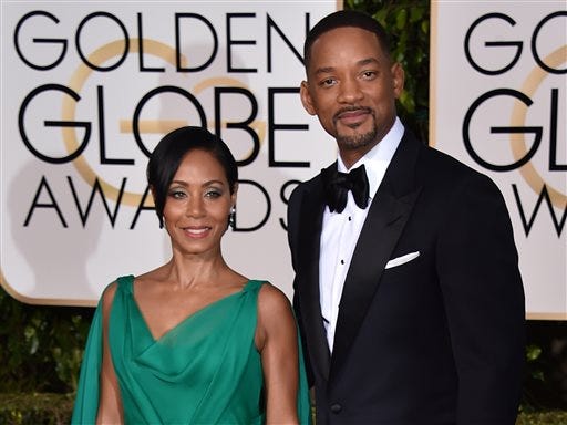 FILE - In this Jan. 10, 2016 file photo, Jada Pinkett Smith, left, and Will Smith arrive at the 73rd annual Golden Globe Awards at the Beverly Hilton Hotel in Beverly Hills, Calif. Smith and Pinkett-Smith are adding their star power to President Barack Obama's initiative to boost opportunities for vulnerable young Americans. The Will & Jada Smith Family Foundation said Friday, April 29, 2016, it will launch a “Careers in Entertainment Tour” to support Obama's My Brother's Keeper Initiative on its two-year anniversary. (Photo by Jordan Strauss/Invision/AP, File)