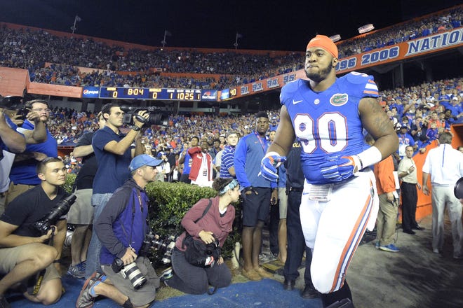 Florida defensive lineman Jonathan Bullard runs onto the field before a college football game against Florida State in Gainesville, Fla., Saturday, Nov. 28, 2015. Bullard was picked by the Chicago Bears in the third round of the NFL Draft on Friday. AP Photo/Phelan M. Ebenhack