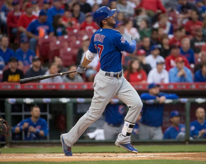 Chicago Cubs' Kris Bryant hits a two-run home run in the first inning of a baseball game against the Cincinnati Reds, Thursday, April 21, 2016, in Cincinnati. The Cubs won 16-0 with starting pitcher Jake Arrieta recording a no-hitter. (AP Photo/John Minchillo)