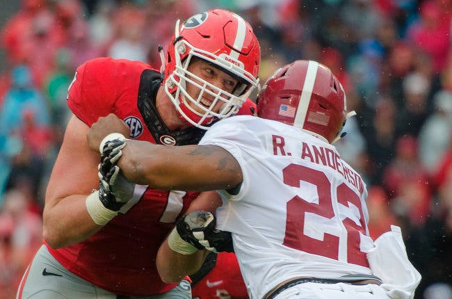 Georgia offensive tackle John Theus (71) throws a block for Georgia running back Sony Michel (1) (not pictured) on Alabama linebacker Ryan Anderson (22) during an NCAA football game between the Georgia Bulldogs and the Alabama Crimson Tide in Athens, Ga., on Saturday, October 3, 2015. (Taylor Craig Sutton/Staff, Taylorcraigsutton.com)