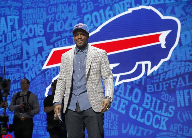 Alabama's Reggie Ragland poses for photos after being selected by the Buffalo Bills as the 41st pick in the second round of the 2016 NFL football draft, Friday, April 29, 2016, in Chicago. (AP Photo/Charles Rex Arbogast)