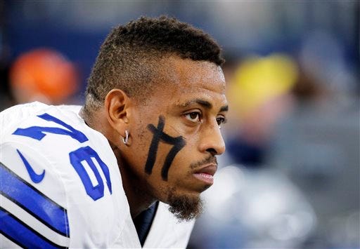 FILE - In this Nov. 1, 2015, file photo, Dallas Cowboys defensive end Greg Hardy watches from the sideline during the team's NFL football game against the Seattle Seahawks in Arlington, Texas. Cowboys owner Jerry Jones says he has ruled out re-signing Hardy after one tumultuous season with the polarizing defensive end. Jones acknowledged Friday night, April 29, 2016, what appeared to be the case for weeks. The Cowboys didn’t want to bring back Hardy after several disruptions in 2015. (AP Photo/Brandon Wade, File)