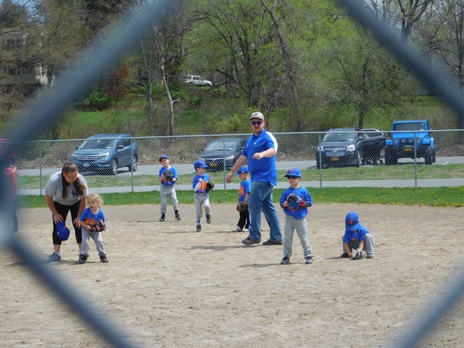 Volunteer coaches are important to the success of Little League Baseball. Here, young Walden Little Leaguers are taught the fundamentals of the game. PHOTO PROVIDED BY EMMA GARRISON