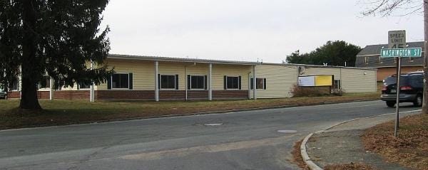 The site of the Russell-Darling House in Mendon now houses this building of Visual Magnetics, a family-owned business providing magnetic receptive print film technology. COURTESY PHOTO