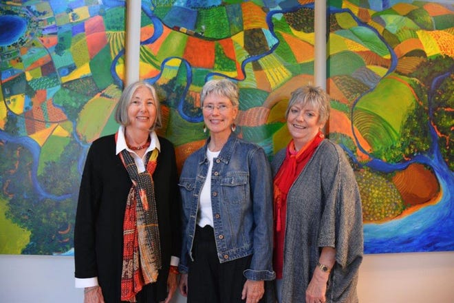 Walton County artists Susan Lucas, Miffie Hollyday, and Nan Ream with their creation “If You Could Fly.”
