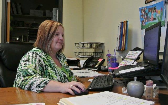 Lavaca High School Principal Felicia Owen works in her office at the school April 21. Thomas Saccente • Times Record