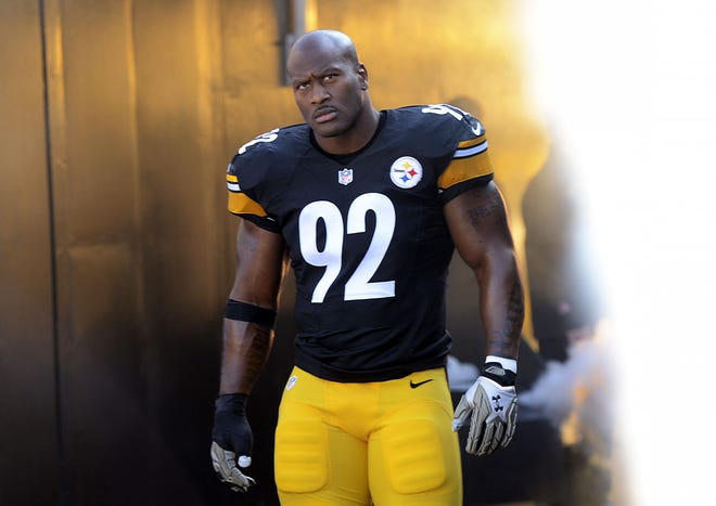 Linebacker James Harrison scowls up at the crowd as he is introduced to the crowd before the Steelers game against Oakland on Nov. 8, 2015.