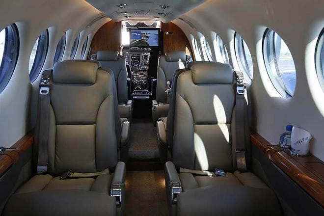 The interior of a King Air 350 plane flown by Wheels Up, which offers private air travel sold by flight hours