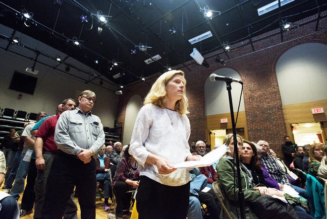 Kittery resident Tricia Robillard expresses frustration over her estimated sewer betterment assessment during a public workshop held by the Kittery Town Council Monday evening at the Kittery Community Center.  

Photo by Amy Donle